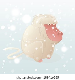 mono blanco sentado en la nieve