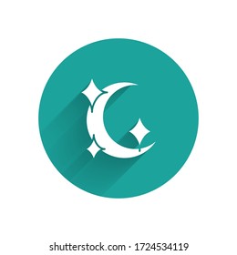 White Moon and stars icon isolated with long shadow. Green circle button. Vector Illustration