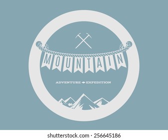 white mountain and climbing emblem