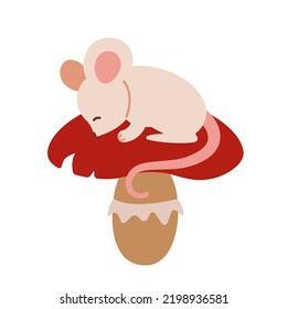 White mouse sleeping on red mushroom.