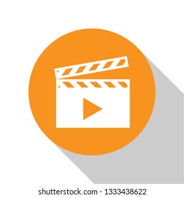 White Movie clapper icon isolated on white background. Film clapper board icon. Clapperboard sign. Cinema production or media industry concept. Orange circle button. Flat design. Vector Illustration