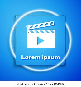 White Movie clapper icon isolated on blue background. Film clapper board. Clapperboard sign. Cinema production or media industry concept. Blue square button. Vector Illustration