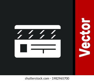 White Movie clapper icon isolated on black background. Film clapper board. Clapperboard sign. Cinema production or media industry.  Vector Illustration