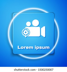 White Movie or Video camera and gear icon isolated on blue background. Adjusting app, service concept, setting options, maintenance, repair, fixing. Blue square button. Vector Illustration