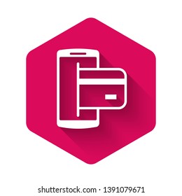 White NFC Payment icon isolated with long shadow. Mobile payment. NFC smartphone concept. Transfer icon. Pink hexagon button. Vector Illustration