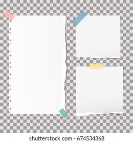 White note, notebook, copybook paper strips stuck with colorful sticky tape on grey squared background.