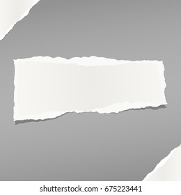 White note, notebook, copybook paper stuck on grey squared background.