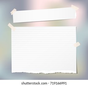 White note, notebook, copybook paper strips stuck with sticky tape on colorful background.