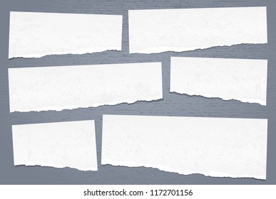 White note, notebook paper pieces with torn edges and stains stuck on dark blue grunge backgroud. Vector illustration.