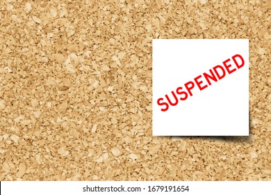 White note with word suspended on cork board background  with copy space (Vector)