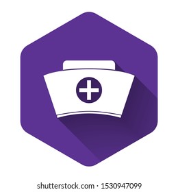 White Nurse hat with cross icon isolated with long shadow. Medical nurse cap sign. Purple hexagon button. Vector Illustration