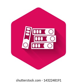 White Office folders with papers and documents icon isolated with long shadow. Office binders. Archives folder sign. Pink hexagon button. Vector Illustration