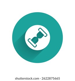 White Old hourglass with flowing sand icon isolated with long shadow background. Sand clock sign. Business and time management concept. Green circle button. Vector