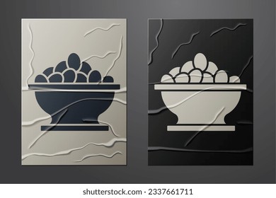 White Olives in bowl icon isolated on crumpled paper background. Paper art style. Vector