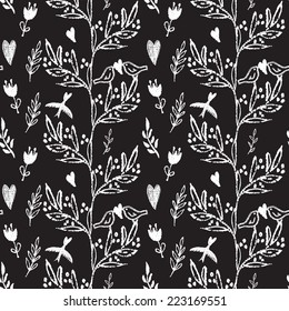 White on black hand drawn seamless pattern with weed, flowers and birds.