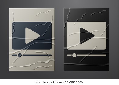 White Online play video icon isolated on crumpled paper background. Film strip with play sign. Paper art style. Vector Illustration