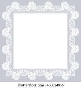 White openwork lace napkin on a gray background