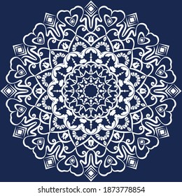 White, openwork ornament on a dark blue background