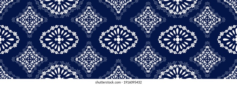 White ornament on blue seamless pattern. Vintage, paisley elements. Ornamental traditional, ethnic, turkish. Great for fabric and textile, wallpaper, packaging.
