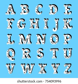 White ornate alphabet text with floral elements