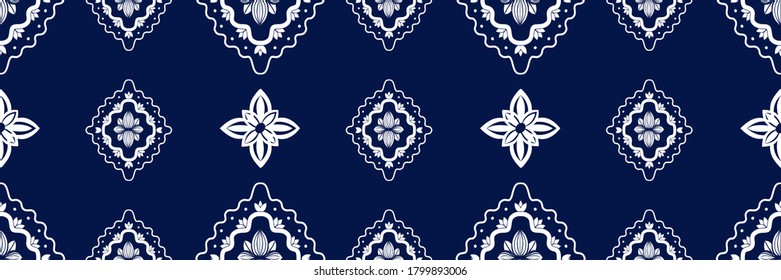 White ornate on blue luxury background. Damask style vector pattern. Renaissance surface design