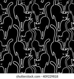 White outline cats on a black background. Vector seamless pattern.