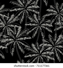 White  outline palm trees on the black background. Vector seamless pattern. Tropical illustration. Jungle foliage.