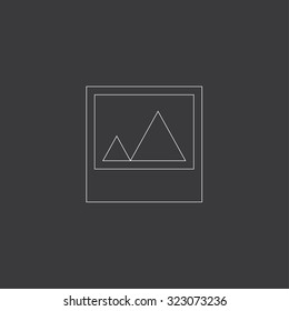 A White Outlined Icon on Grey Background - Picture