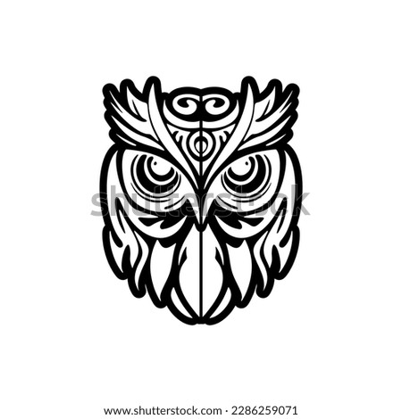 Black and white owl tattoo adorned with Polynesian patterns.