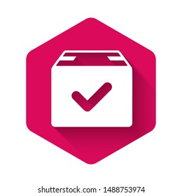 White Package box with check mark icon isolated with long shadow. Parcel box with checkmark. Approved delivery or successful package receipt. Pink hexagon button. Vector Illustration