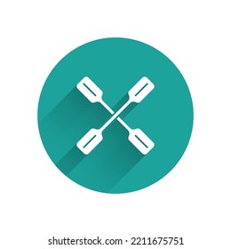 White Paddle icon isolated with long shadow. Paddle boat oars. Green circle button. Vector