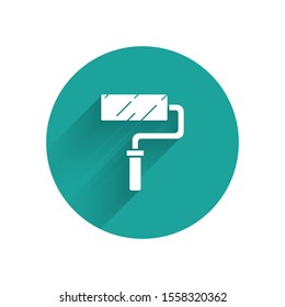 White Paint roller brush icon isolated with long shadow. Green circle button. Vector Illustration