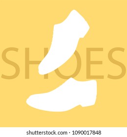 white pair of shoes on yellow background