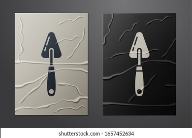 White Palette knife icon isolated on crumpled paper background. Paper art style. Vector Illustration