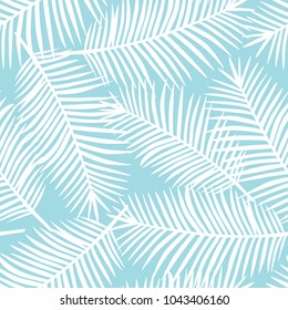 white palm leaves on a blue background exotic tropical hawaii seamless pattern vector