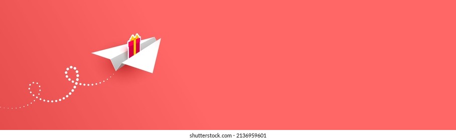 White paper airplane with gift box icon is flying forward over red background. Gift sending, holiday greetings and pleasant surprise. Horizontal banner with place for your text and design 