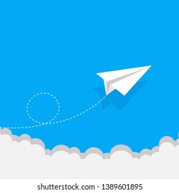 White paper airplane with shadow. Paper airplane on blue background. Leadership, teamwork ,Abstract, Blue, Business. Paper airplane in the sky with clouds