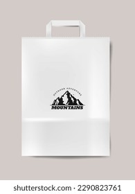 white paper bag with mountains logo, logo for sportswear store or mountain clothing store