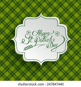 White paper banner in vintage or retro style over green pattern. St. Patrick`s day greeting card template