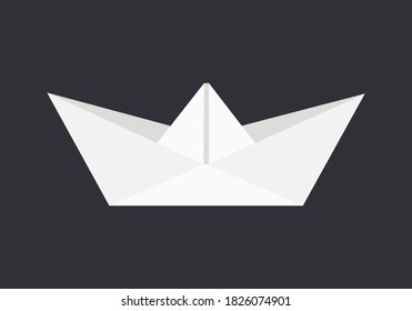 White paper boat on black background.