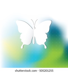 White paper butterfly on modern blue and green abstract background.
