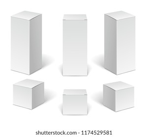 White paper cardboard package boxes. Set of blank vertical cosmetic, medical and electronic devices boxes isolated on white background.