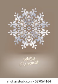 White paper christmas snowflake on a light brown background. EPS 10 vector file included