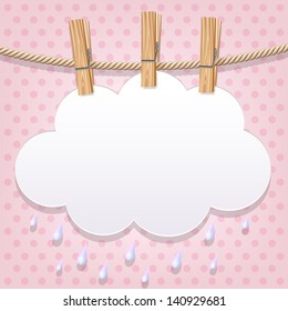 White paper cloud hanging by clothes peg on a clothesline