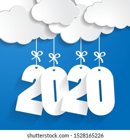white paper clouds with numbers 2020 of coming year hanging on strings with bows on blue background