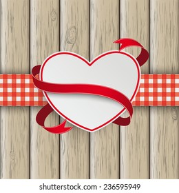 White paper emblem with checked towel on the wooden background. Eps 10 vector file.