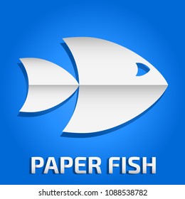white paper fish on blue background
