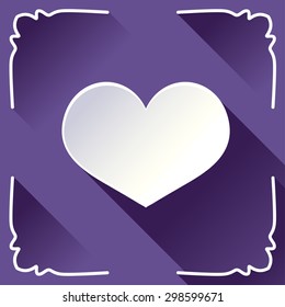 White paper heart on dark background.