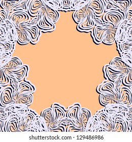 White paper lace frame on yellow background.