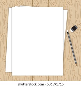 White paper on wood background. 